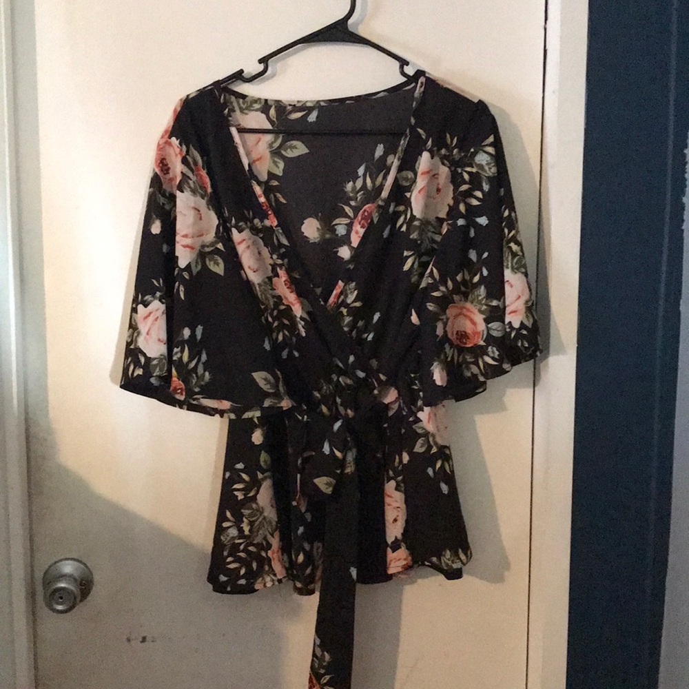 Brand new floral blouse.